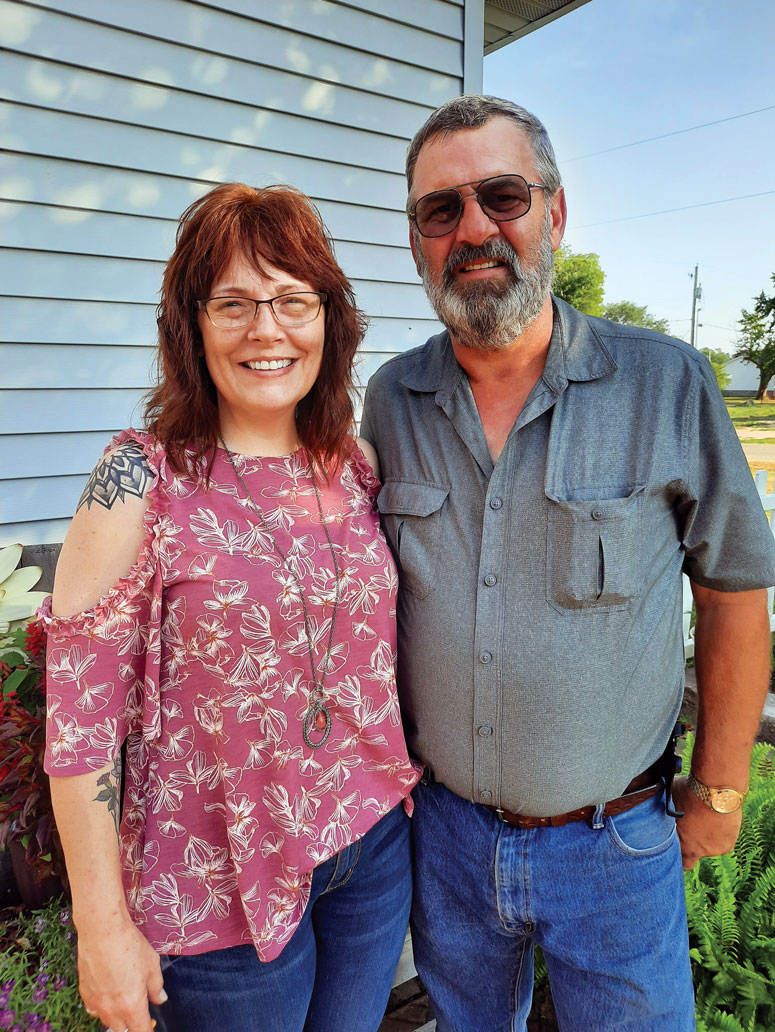 <b>Steve and Molly Jones outside their home in rural Henderson County, Illinois.</b> (Jones family photo)