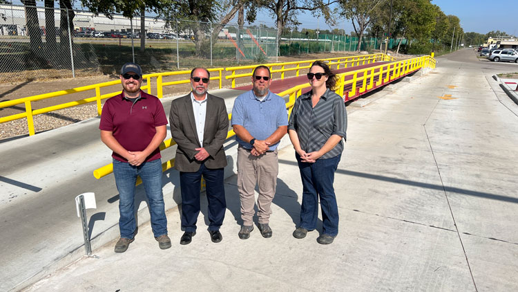 Ribbon cut on CANCO truck scale, semi parking project