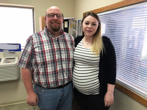 <b>Caitlin Bliesener, right, new human resource associate at Carl A. Nelson & Company, with her father, Director of Field Resources Jerry Bliesener, in his warehouse office in Burlington.</b> (CANCO photo)